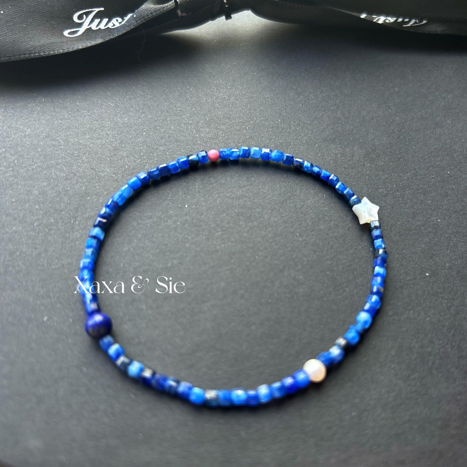 Meaningful couple bracelets crafted with blue aquamarine and pink rose beads, perfect for gifts